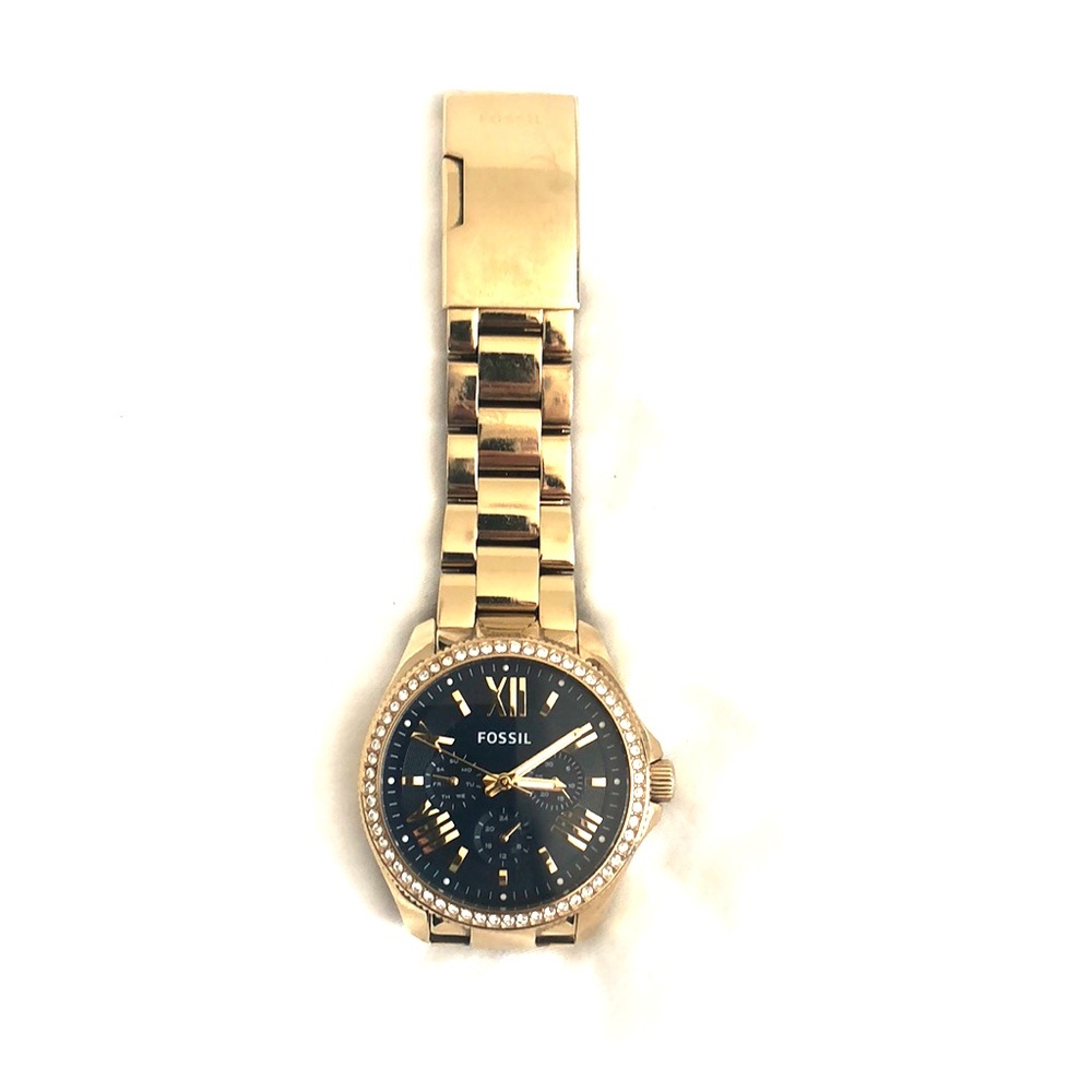 Gold fossil watch